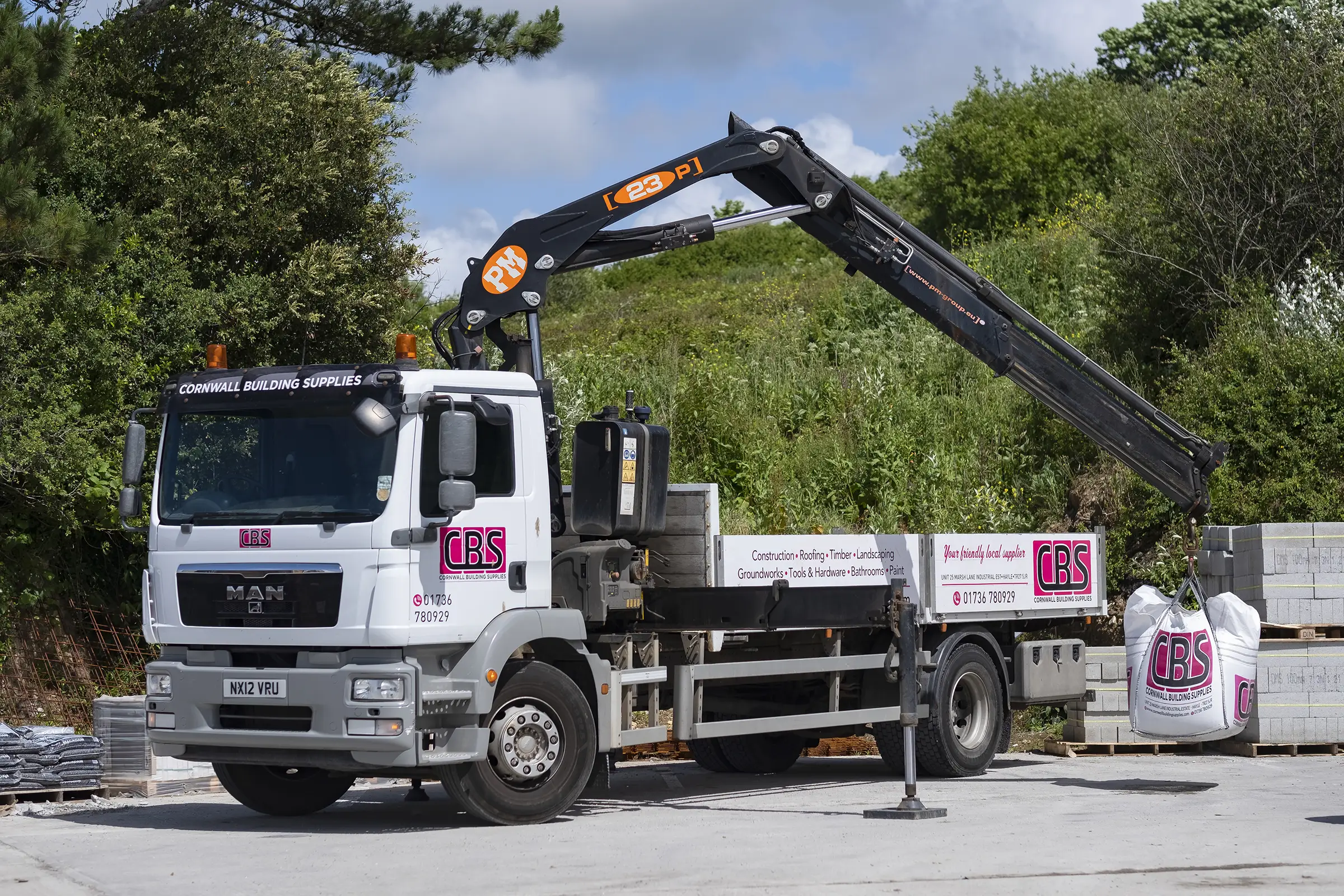 Photograph of a Hiab lorry-loader at Cornwall Building Supplies.